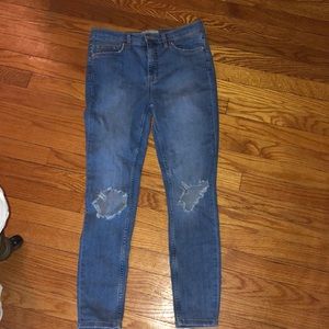 Free people blue jeans with ripped knees